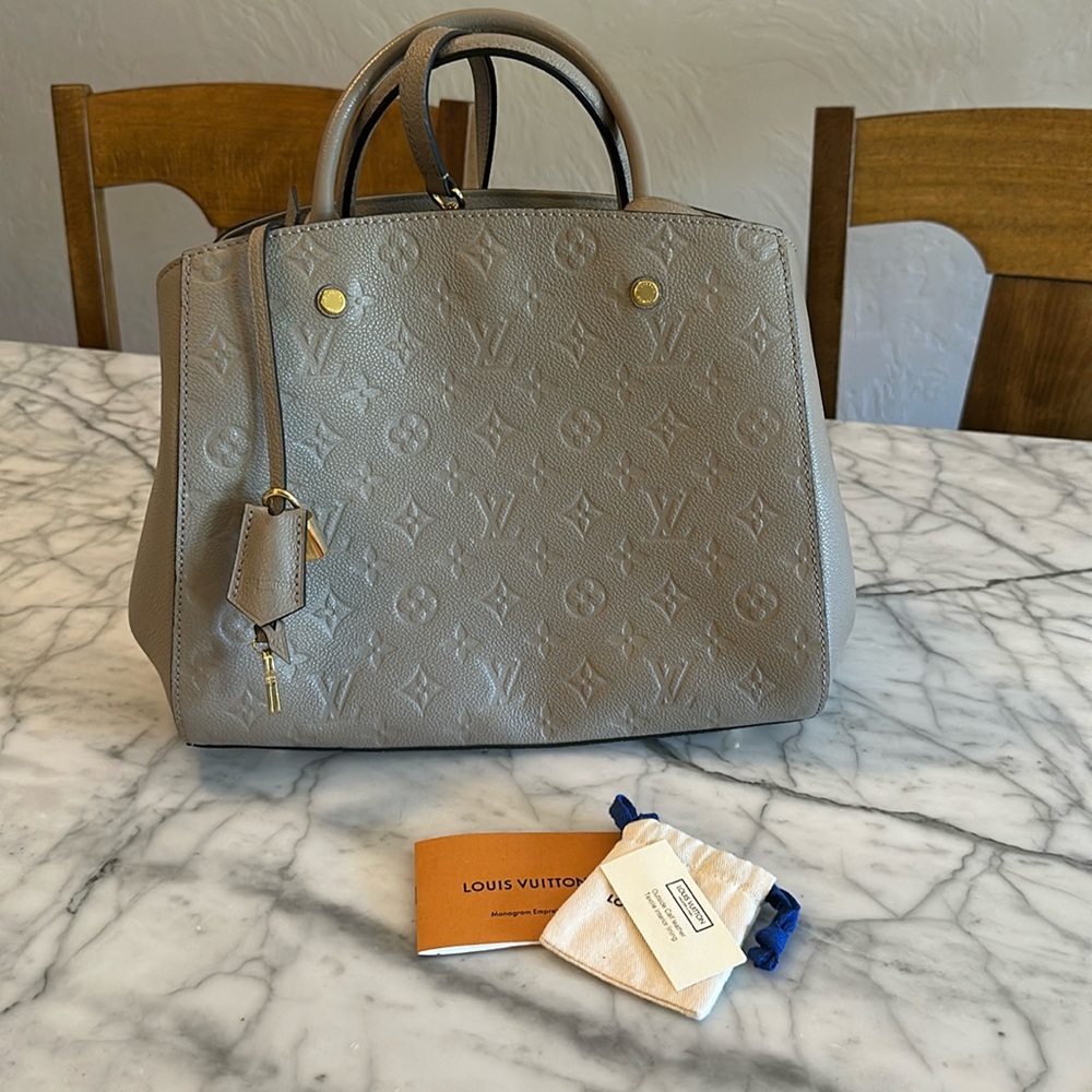 Louis Vuitton Beige Satchel with Embossed Pattern and Gold Hardware